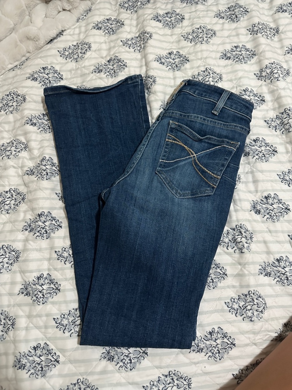 Dark wash Ariat bootcut jeans
